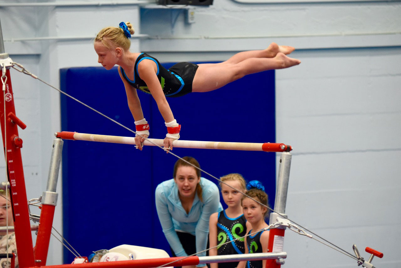 Emily on bars